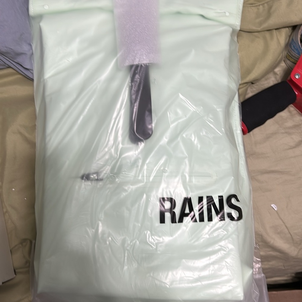 Rains roll up back pack color mineral